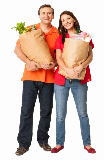 Couple holding grocery bags